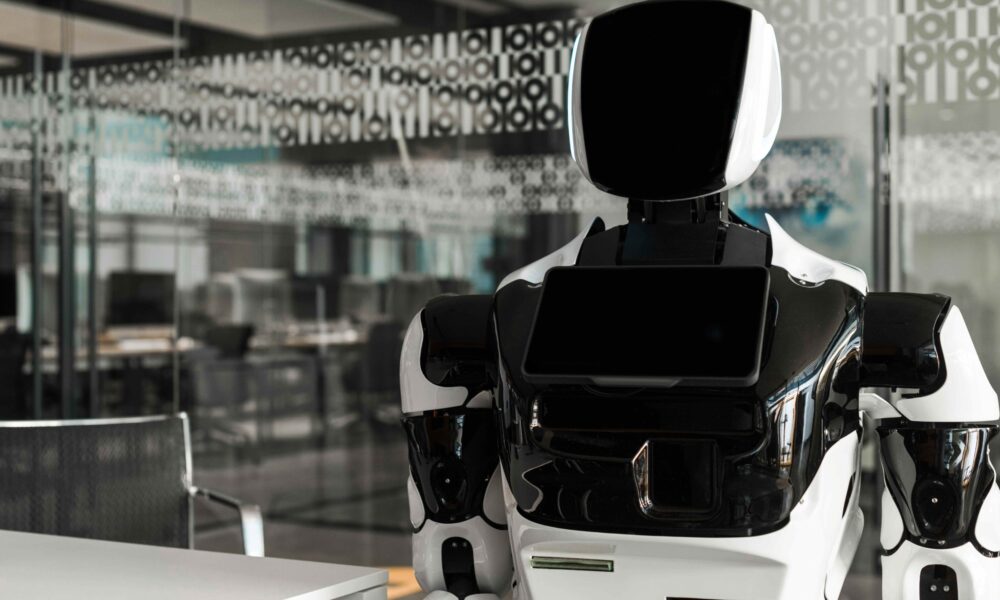 Robot interacting with attendees at an AI-enhanced event, showcasing advanced technology and innovative audience engagement.