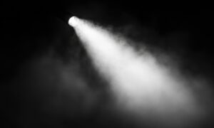 Light cutting through the smoke