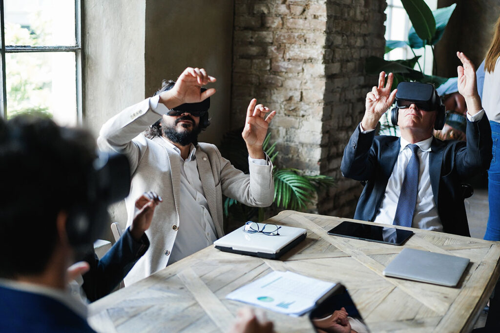 Event attendees engaging with a virtual reality experience, wearing VR goggles and interacting with immersive digital content