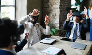 Event attendees engaging with a virtual reality experience, wearing VR goggles and interacting with immersive digital content