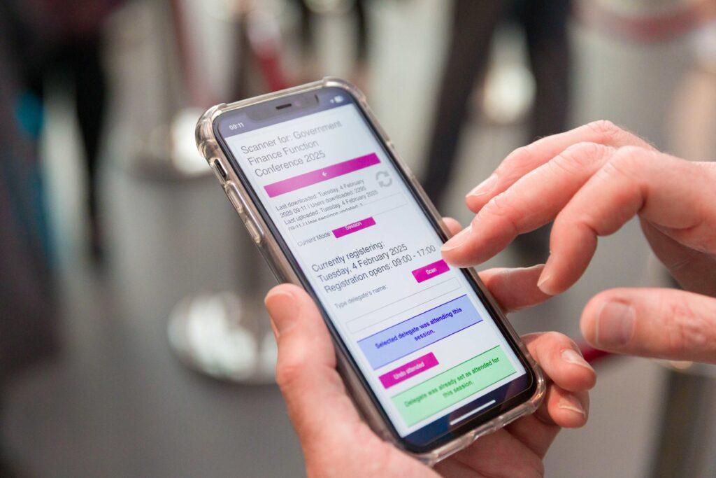 Someone using a mobile event management app