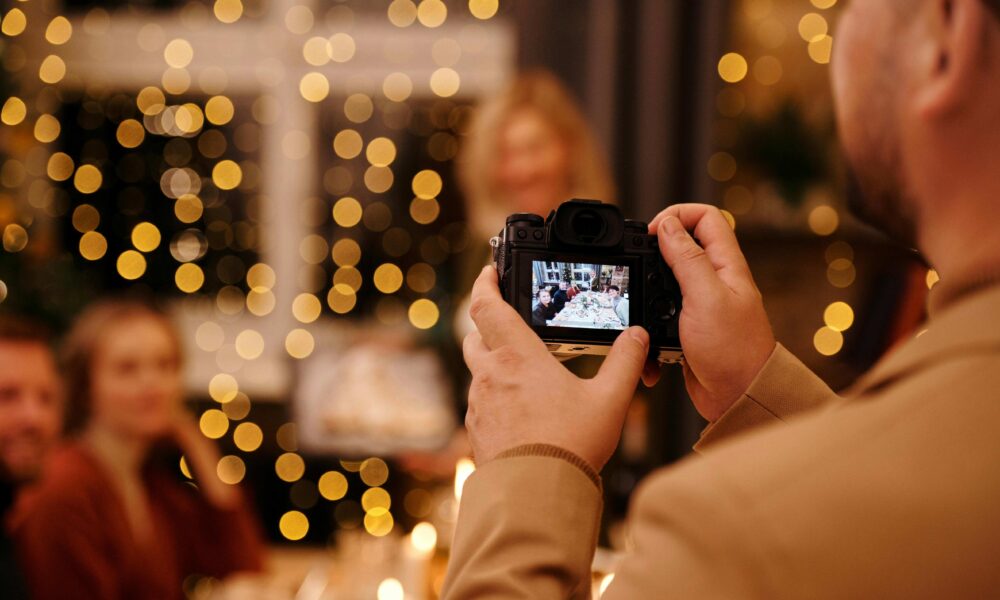 Corporate event photographer taking photo of delegates