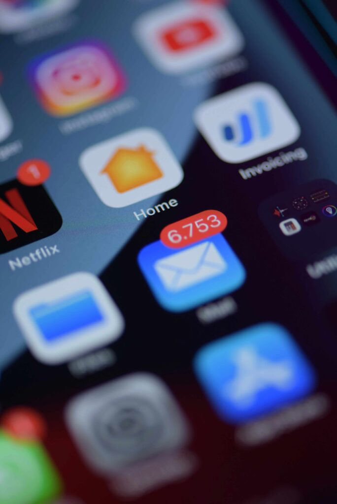 A phone with many email notifications symbolising cognitive and digital overload