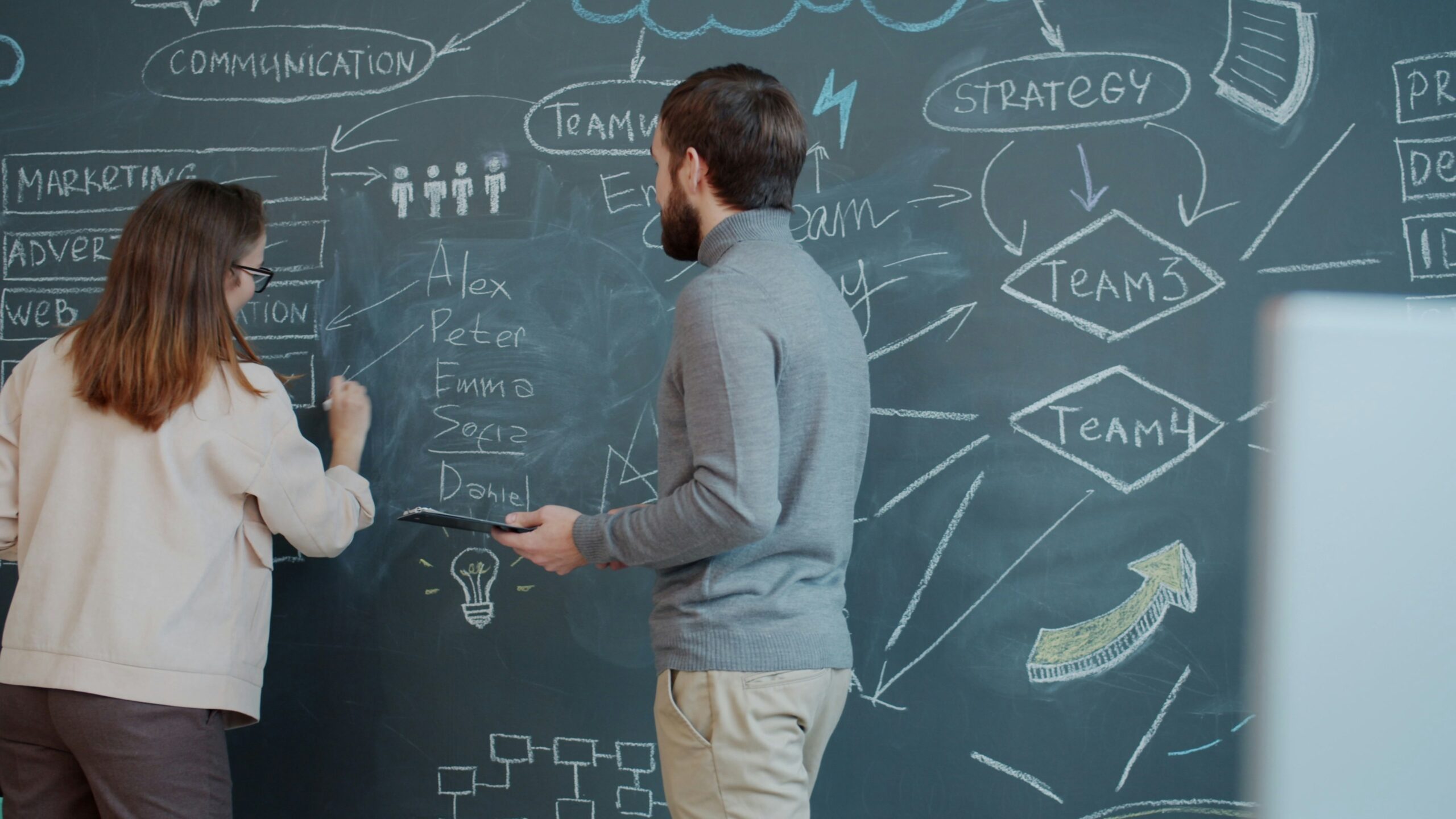 Team communication strategy board with sticky notes outlining messaging plans, campaign stages, and audience engagement tasks.