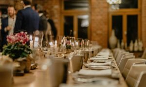A luxurious gala dinner with table layout and guests.