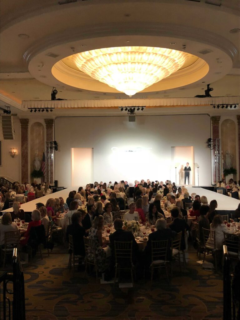 A corporate gala dinner with guests.