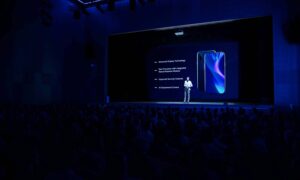 A virtual/hybrid media launch event with speaker demonstrating new product.